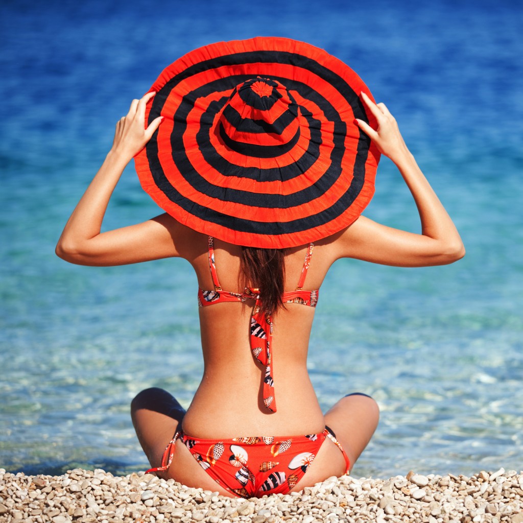 Young fashion woman rest on the beach