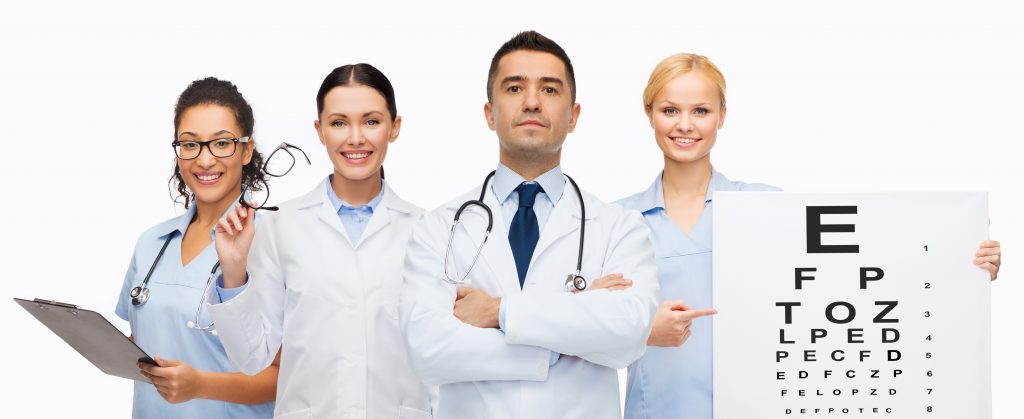 group of doctors with eye chart and glasses