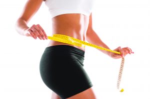 Woman Measuring Her Perfect Waist